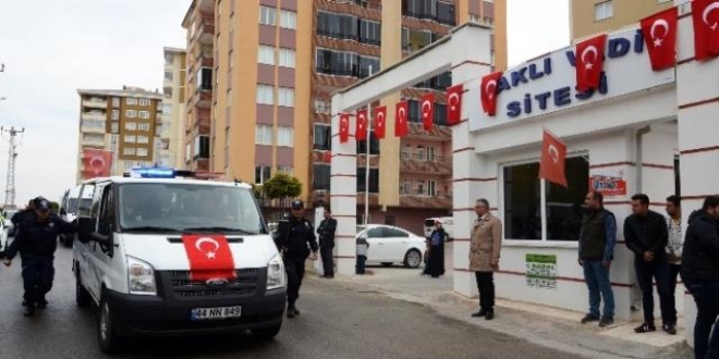 ehit iki polisin naalar Adana'ya getirildi