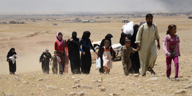 Musul'da 2 buçuk ayda 145 bin kişi evlerini terk etti