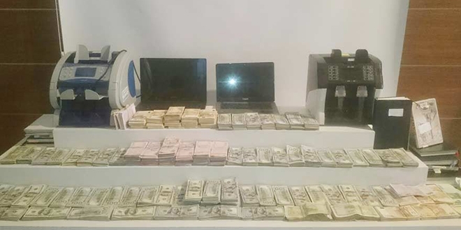 Göçmen kaçakçılarına operasyon: Evlerinden servet çıktı