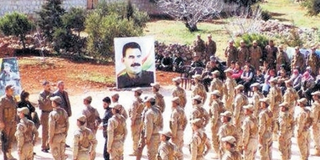 Hani PKK ile YPG arasnda ba yoktu?  Apo posteri altnda yemin