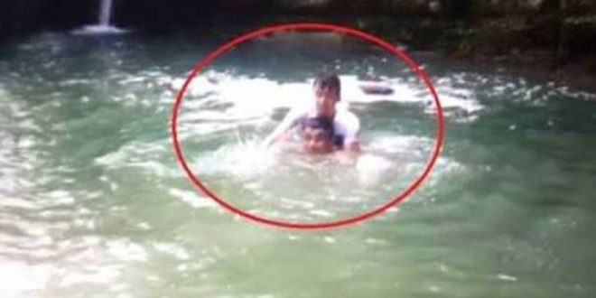 Kurtarmak istedi�i karde�iye birlikte bo�uldu