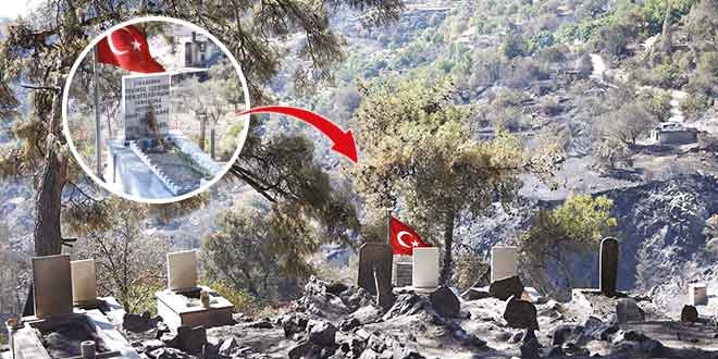 Şehitlik ve Türk bayrağı sapasağlam ayakta