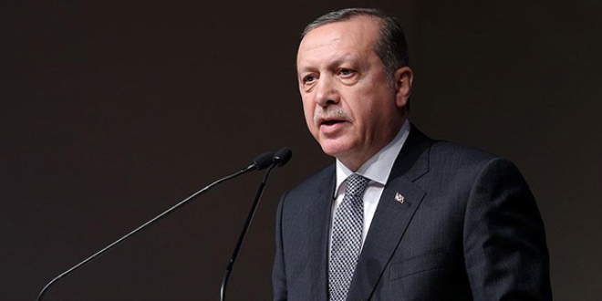 Erdoğan: Darbeciler alınlarına kara bir leke bulaştırdılar