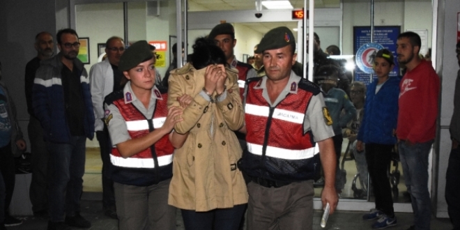Terör suçundan aranan kadın çatı katında yakalandı