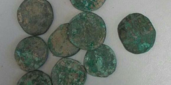 Aranan terörist tarihi eserle yakalandı