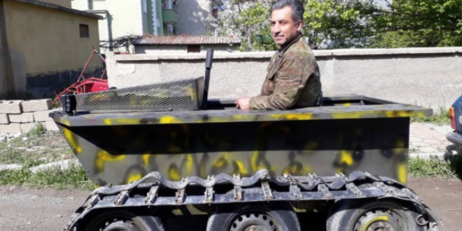 Hurda par�alar�ndan tank g�r�n�ml� arazi arac� yapt�
