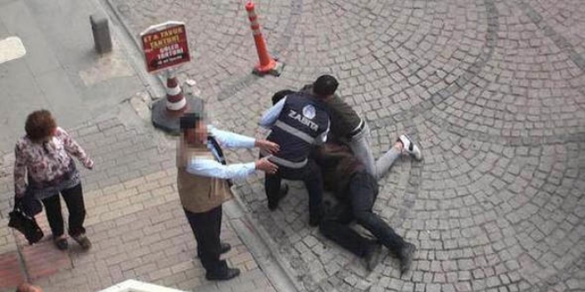 Dilenciye 'vurun' diyen zabıta açığa alındı