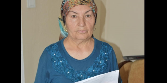 Ya�l� kad�n� g�sterdi�i foto�rafla doland�rd�