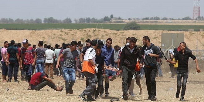 İsrail askerleri AA foto muhabirini yaraladı