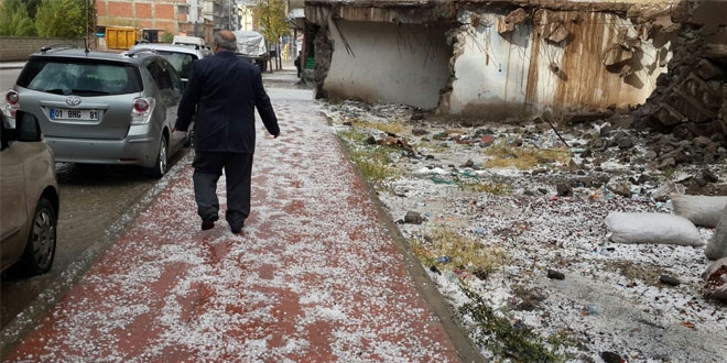 Dolu, A�r�'y� beyaza b�r�d�