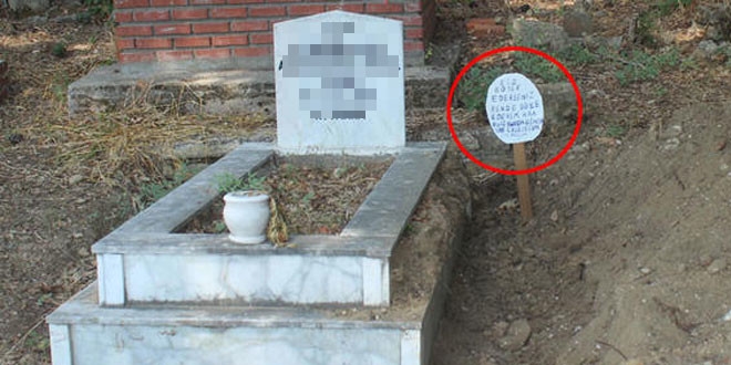 Mezar taşını söküp yanına 'Bu iş bitmedi' yazılı tabela dikti