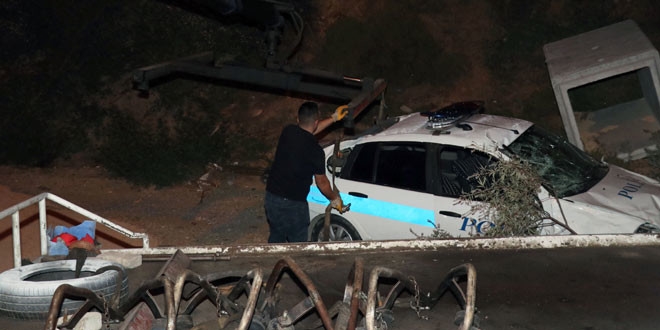 Cezaevini firarisini takip eden polis aracı şarampole uçtu