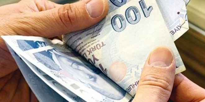 Borcunu yap�land�ran kazan�yor