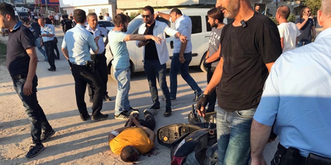 Kaçan şüphelinin yakınları polise saldırdı