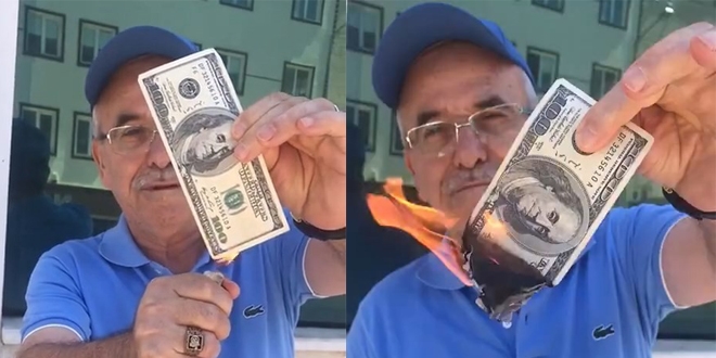 Emekli öğretmen, protesto için 100 dolar yaktı
