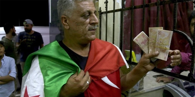 El Bab'da d�viz b�rosu �n�nde eylem: T�rk liras�na destek vaciptir