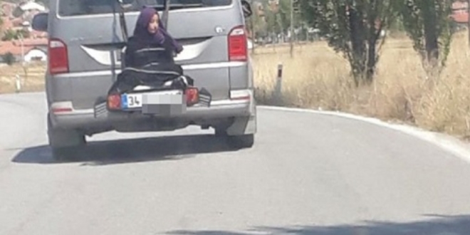 Kadını arabanın arkasına bağlayarak taşıdılar