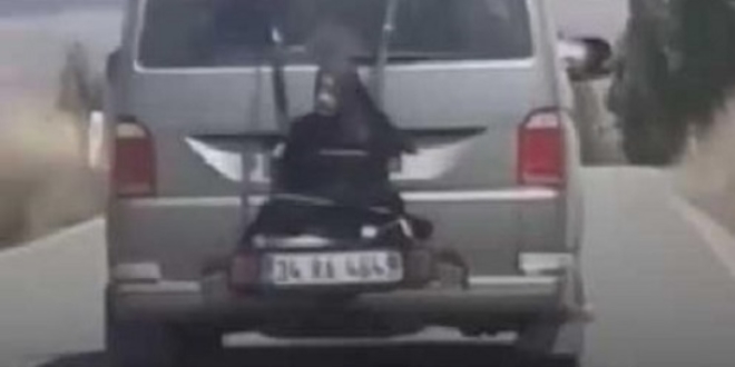 Çocuğunu aracının arkasına bağlayan baba serbest