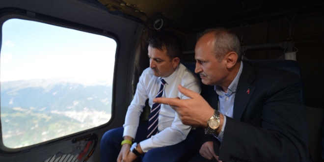 Bakanlar Turhan ve Pakdemirli Yusufeli Barajı'nı helikopterle havadan inceledi
