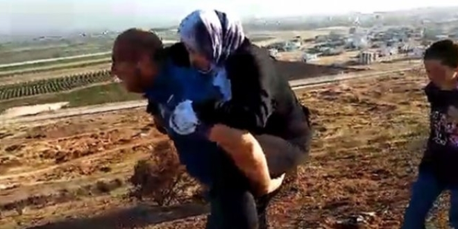 Yaralı Suriyeliyi 2 kilometre sırtında taşıyan polise ödül