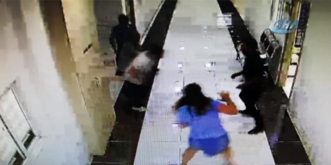 Polisin elinden kaçıp zabıt katibinin saç derisini kopardı
