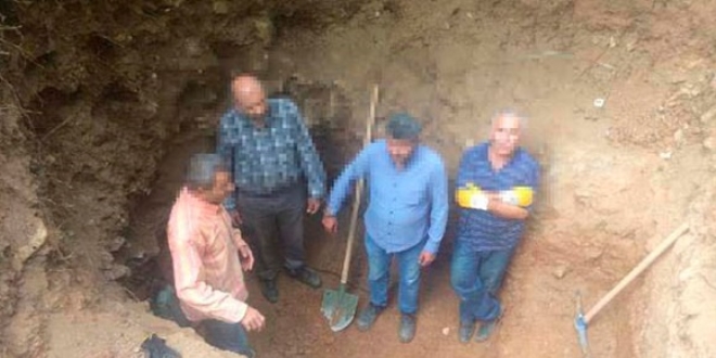 Defineciler, kazdıkları çukurda yakalandı