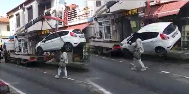 Halatı kopan çekici, arabayı böyle düşürdü