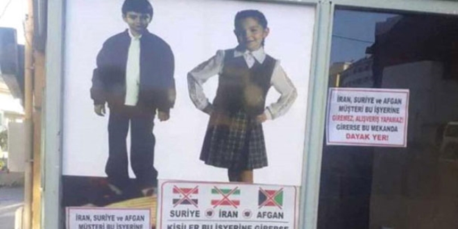 Dükkanının camına astı gözaltına alındı