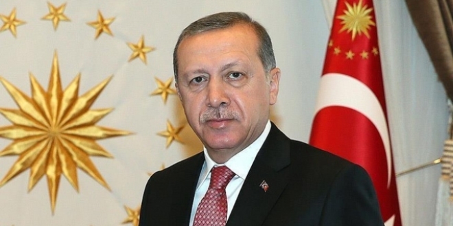 Erdo�an'dan �ehit ailelerine taziye telgraf�