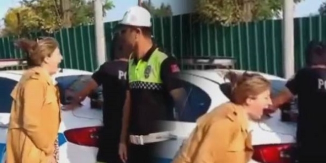 Ehliyetsiz yakalanan öğretmenin çığlıkları polisi isyan ettirdi