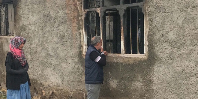 Yangında kocasını alevlerin arasından çıkardı