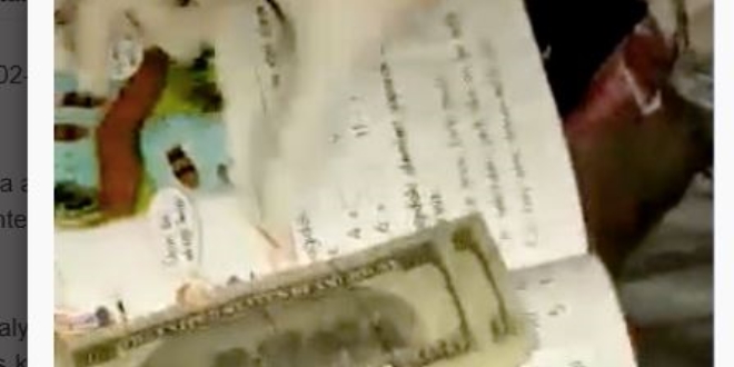 Sahte dolarlar çocuklara ait ders kitaplarının arasından çıktı