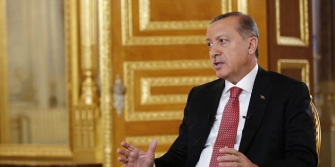 Cumhurbakan Erdoan'dan Fransz soykrmna emal rnek