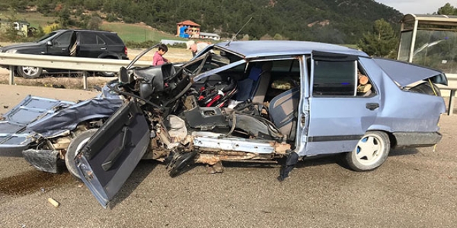 Hurda yığınına dönen otomobilden sağ kurtuldu
