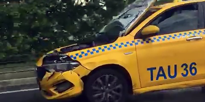 Kaput açık halde trafiğe çıkan taksiciye para cezası