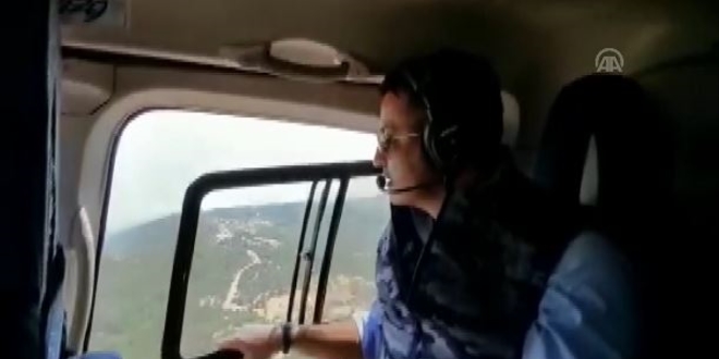 Bakan Pakdemirli, orman yangınını havadan inceledi