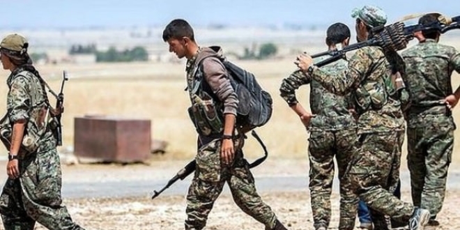 Zorla silah altna alnan Araplar YPG/PKK'dan kayor