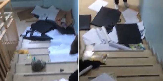 ��rencilerin e�yalar� merdiven bo�lu�una at�ld�