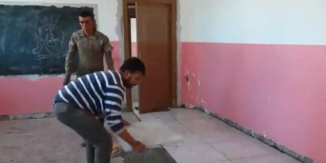 Mehmet�ik, ter�ristlerin tahrip etti�i okulu onar�yor