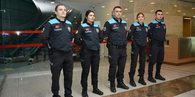 Pasaport polislerine turkuaz yelek