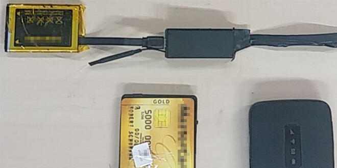 Gömleğine kurduğu düzenekle sınavda kopya çeken kişi tutuklandı