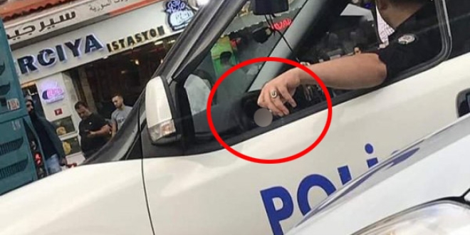 Resmi araçta sigara içen polise soruşturma