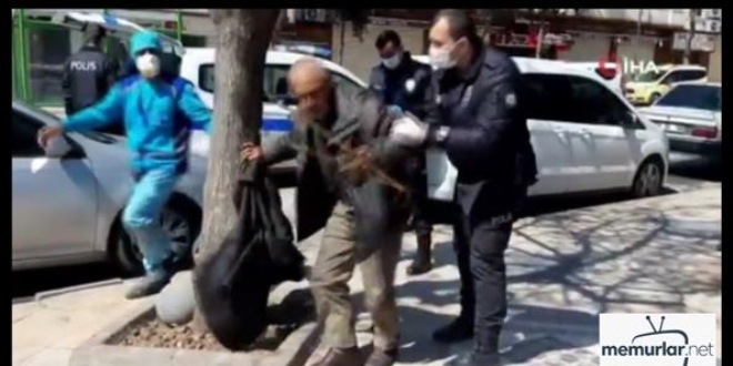 Evine gitmeyi reddeden yaşlı vatandaş görevlilere direndi