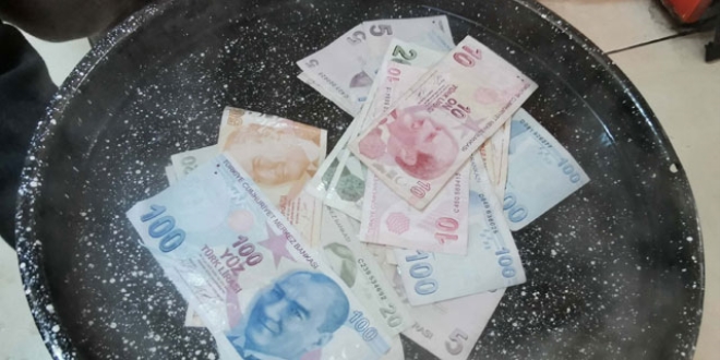 Koronavir�se kar�� banknotlar� 100 derecede kaynat�yor