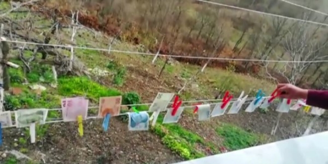 Koronavirüse karşı emekli maaşını kaynar suda yıkadı