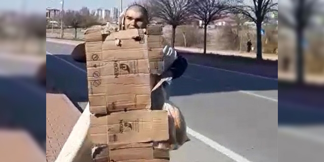 Polise yakalanmamak i�in karton ve �ar�afla gizlendi