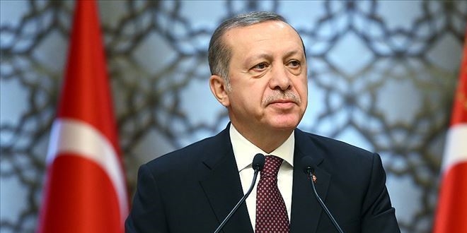 Erdo�an'dan �ehit polis memurunun ailesine ba�sa�l��� mesaj�