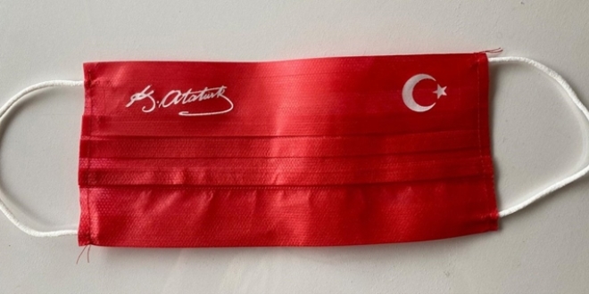 MHP'den Atatrk imzal ve Trk bayrakl maske datlmasna tepki