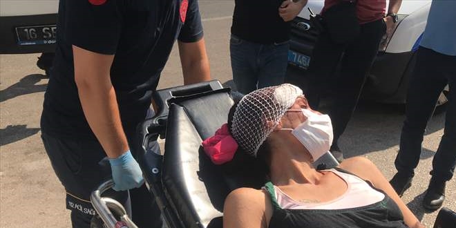 Bursa'da darbedilen kadın banka şubesine sığındı