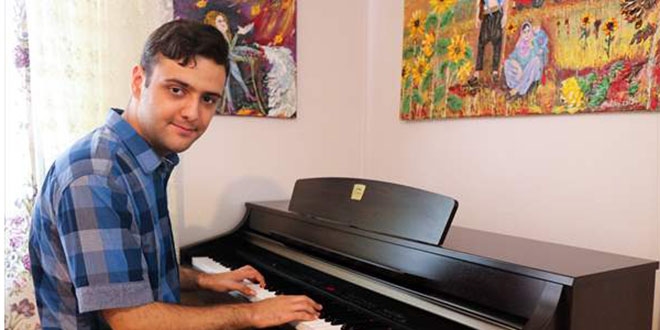 Otizmli Onur, müzik öğretmeni olmak için 'ilk 800 bin şartı'nın kaldırılmasını istiyor